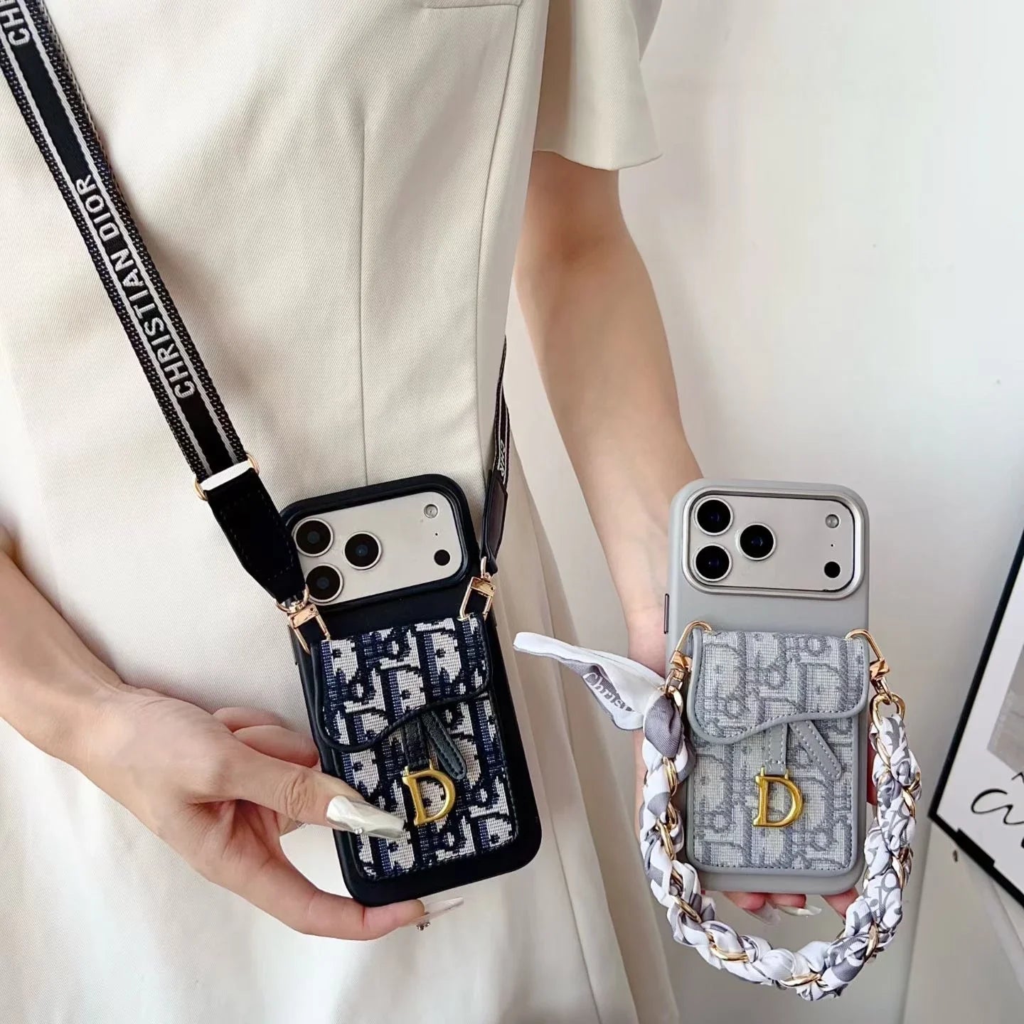 Luxury Dior-inspired iPhone 17 Pro cases with strap and cardholder, blue and grey designs.