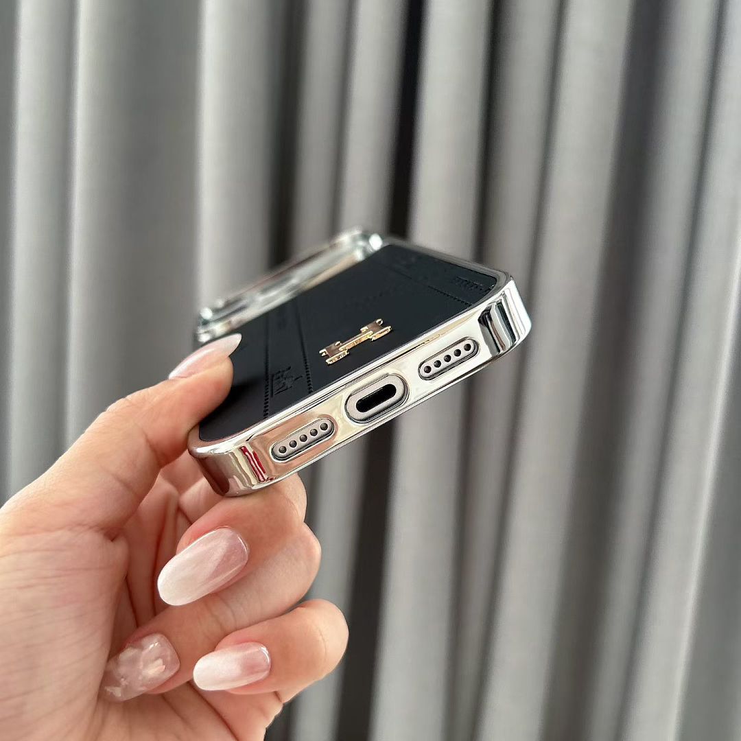 Hermès H accent case for iPhone 17 Pro Max – wrist strap