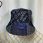 Louis Vuitton bucket hat with monogram pattern on a white background