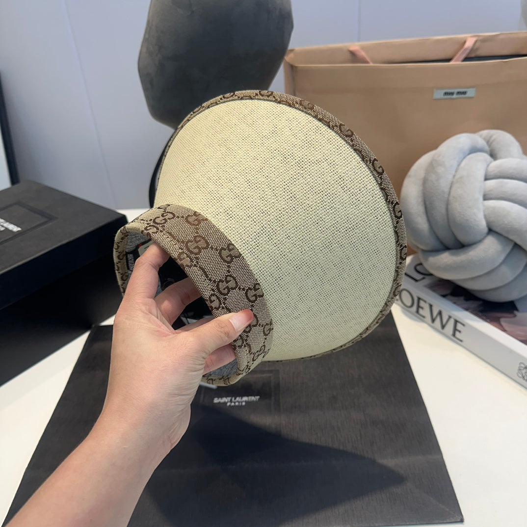 Brown Gucci straw visor hat