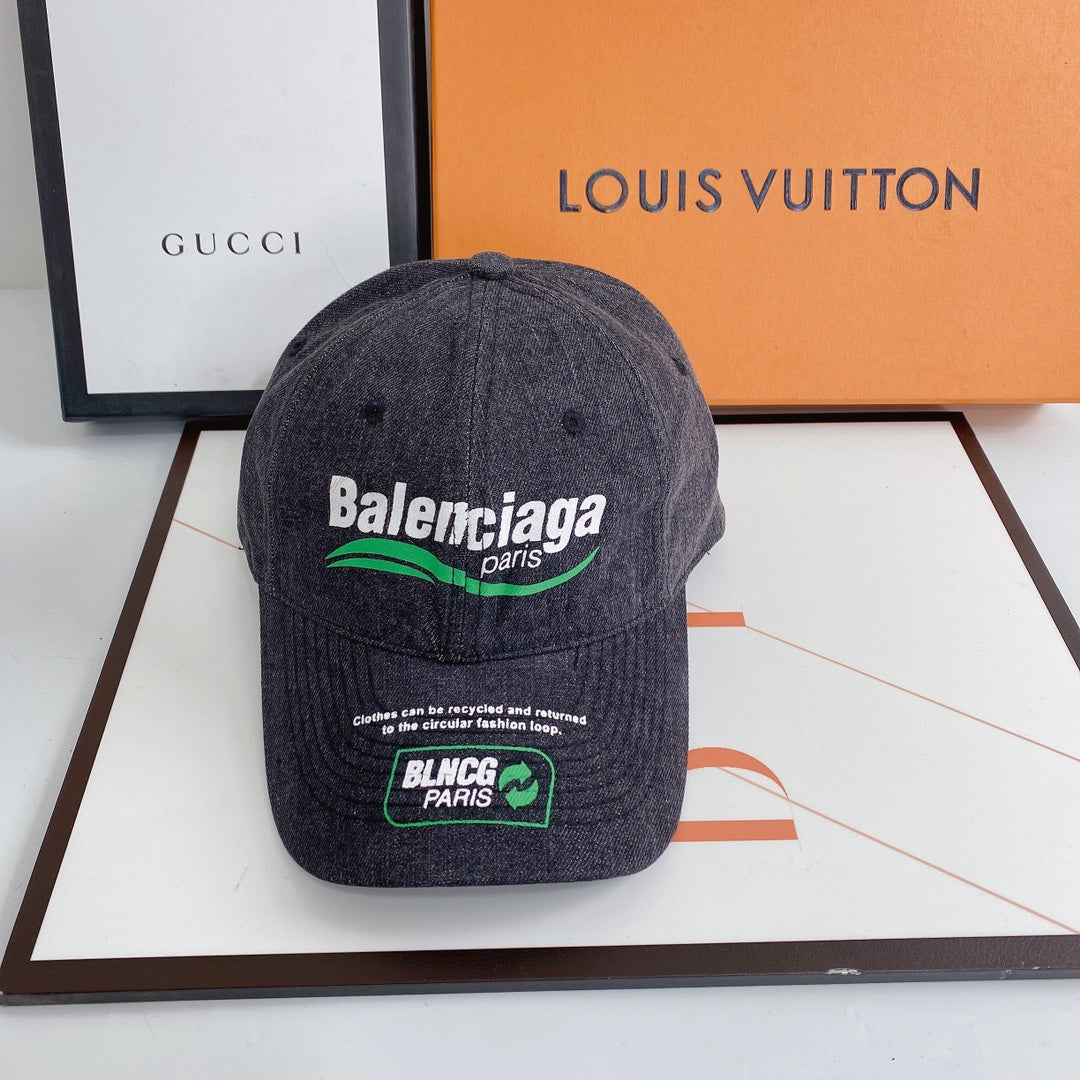Designer Balenciaga washed denim cap angled view