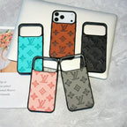 Five phone cases with Louis Vuitton monogram pattern on a gray surface.