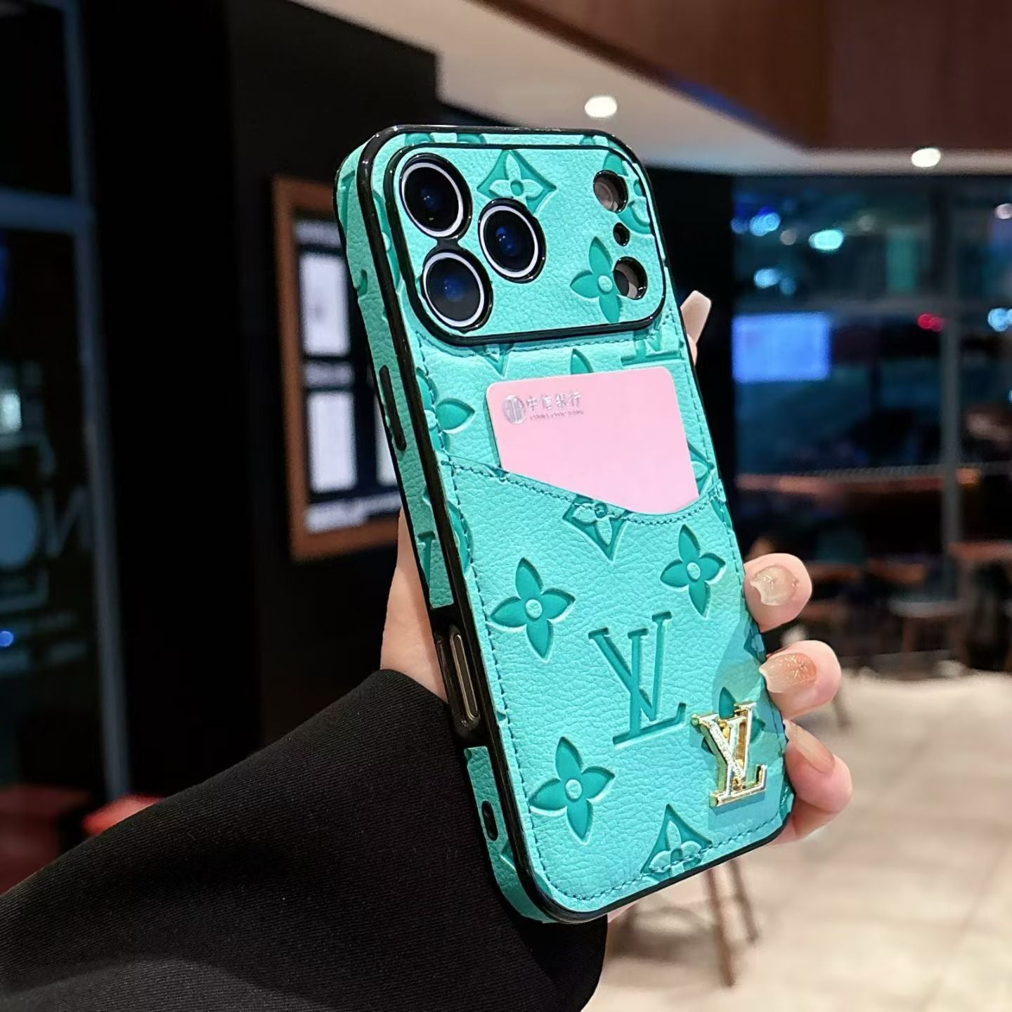 Green Louis Vuitton monogram iPhone case with card holder