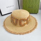 Gucci GG raffia frayed edge straw sun hat front view
