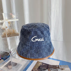 Gucci embroidered denim bucket hat front view