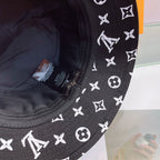 Louis Vuitton black monogram bucket hat with white LV pattern