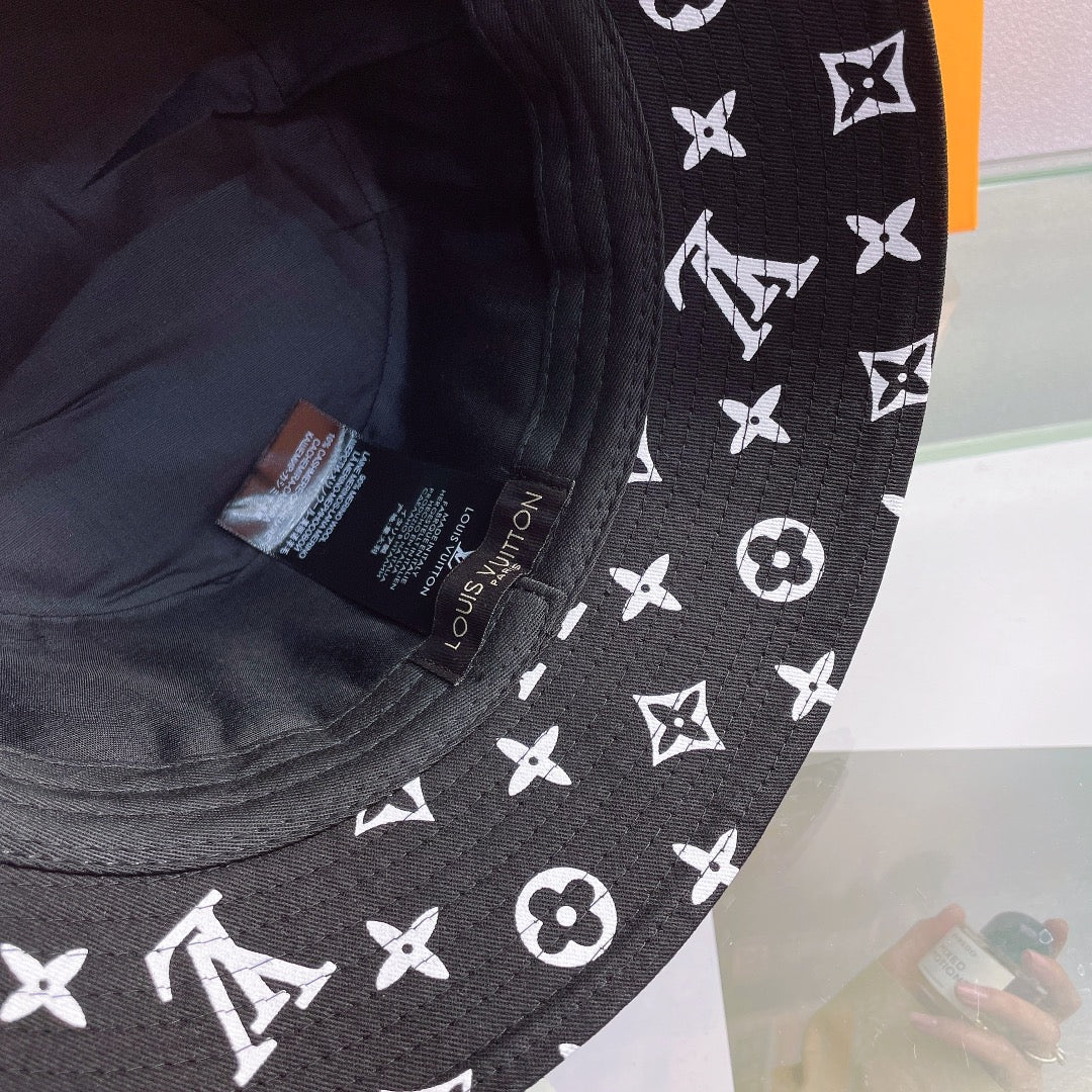 Louis Vuitton black monogram bucket hat with white LV pattern