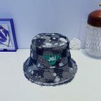 Louis Vuitton distressed denim bucket hat black front view