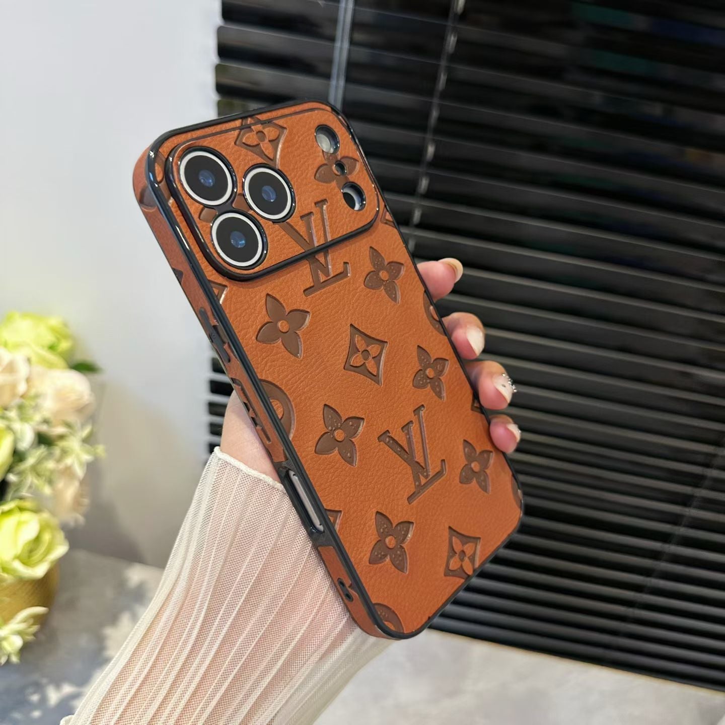 Louis Vuitton iPhone 17 Pro Max case in brown