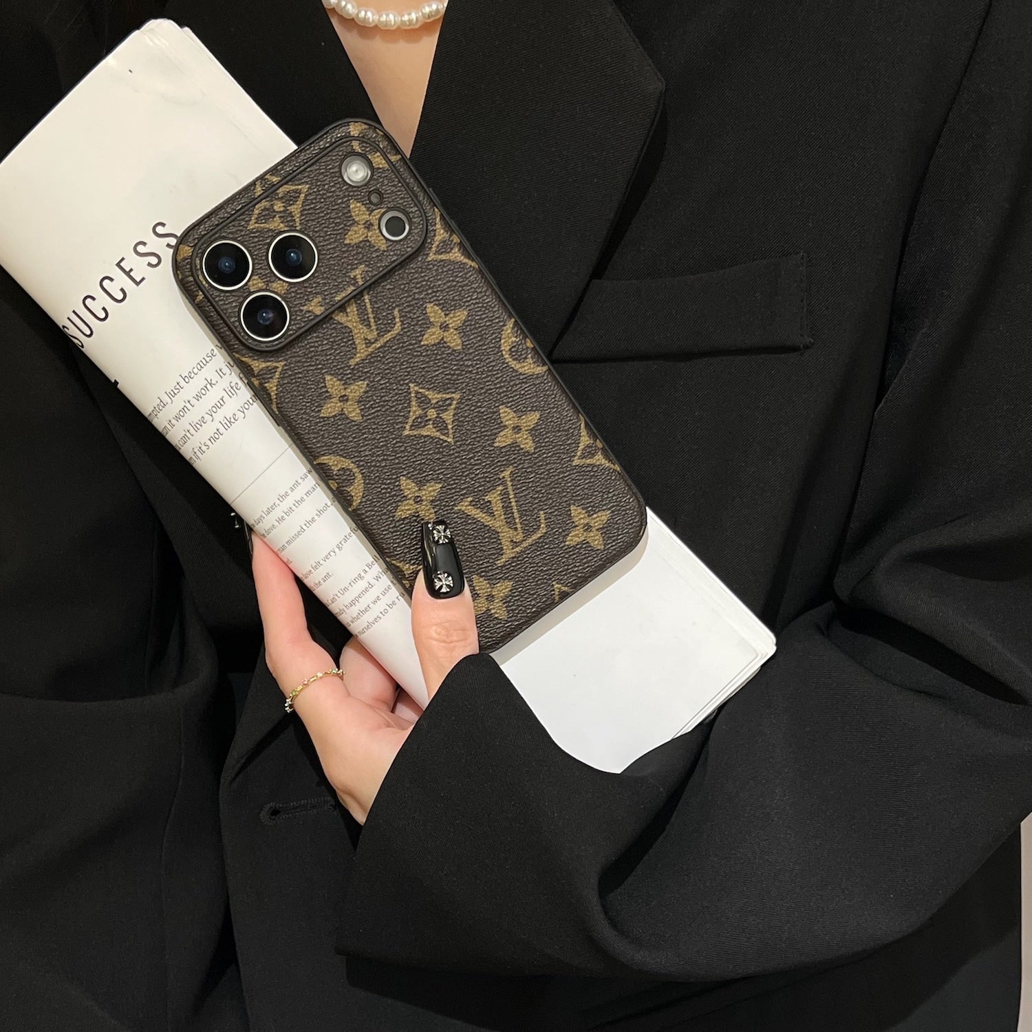 Louis Vuitton iPhone 17 Pro Max case in brown big flower monogram