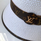 Louis Vuitton monogram designer hat side view
