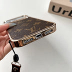 Louis Vuitton monogram wrist strap case for iPhone 17 Pro Max – close-up
