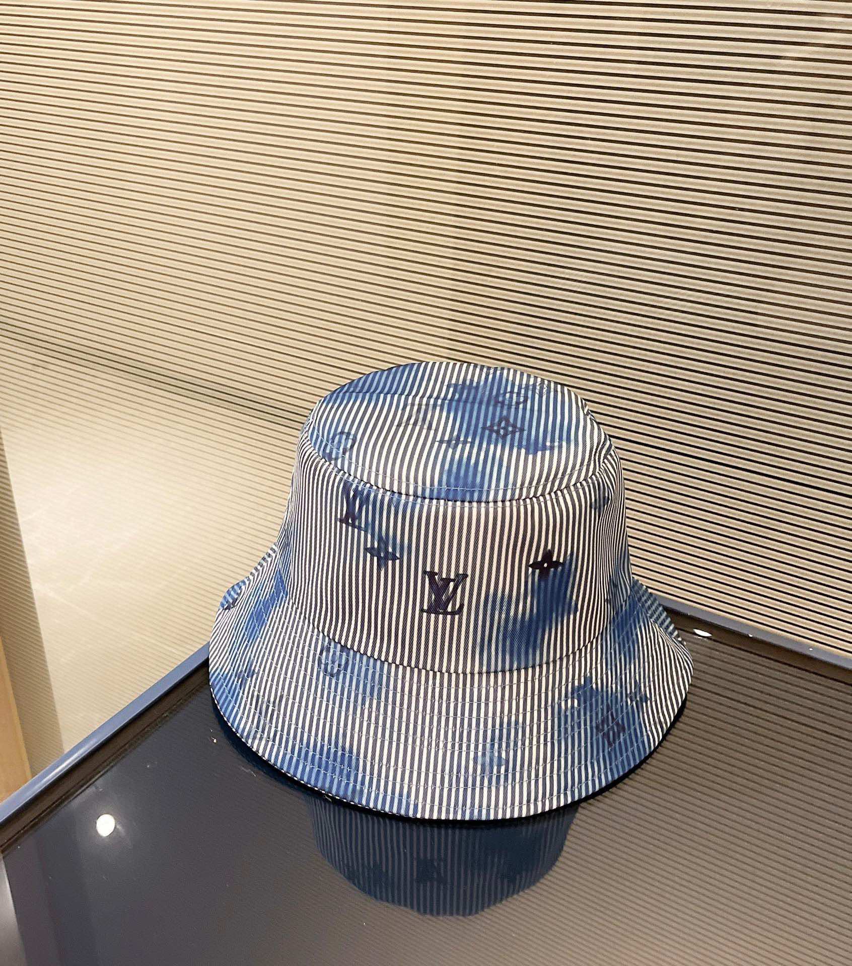Louis Vuitton striped blue bucket hat