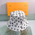 Louis Vuitton white monogram bucket hat with black LV pattern