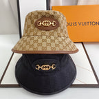 Luxury Gucci bucket hat with gold chain front view