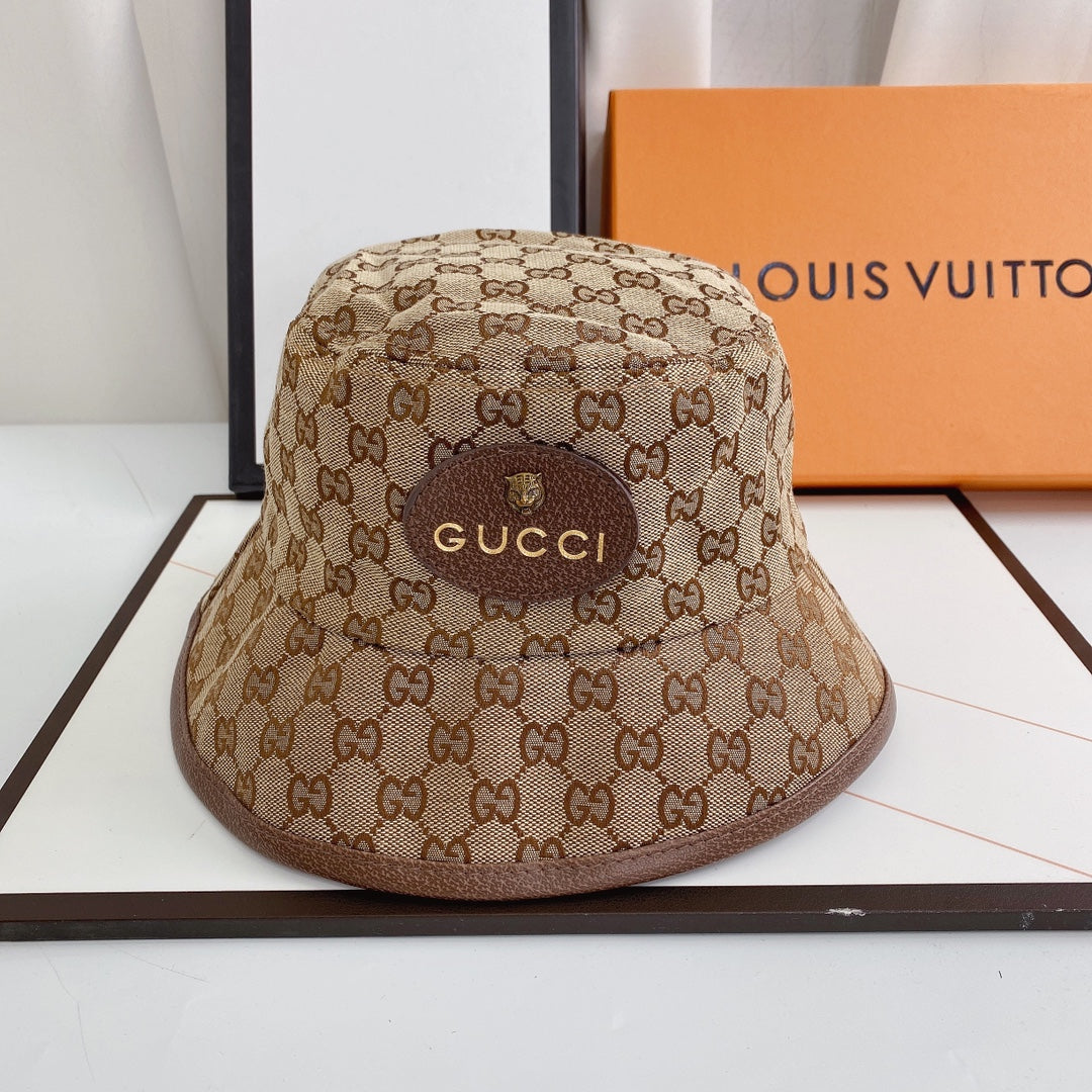 Luxury Gucci embroidered bucket hat espresso brown front view