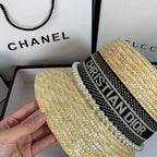 Luxury designer straw bucket hat detail