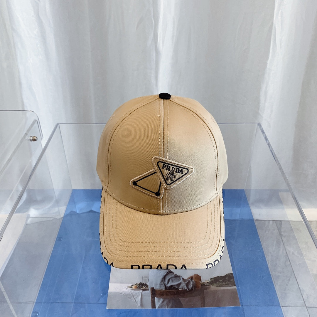 Prada embroidered baseball cap sand beige front view