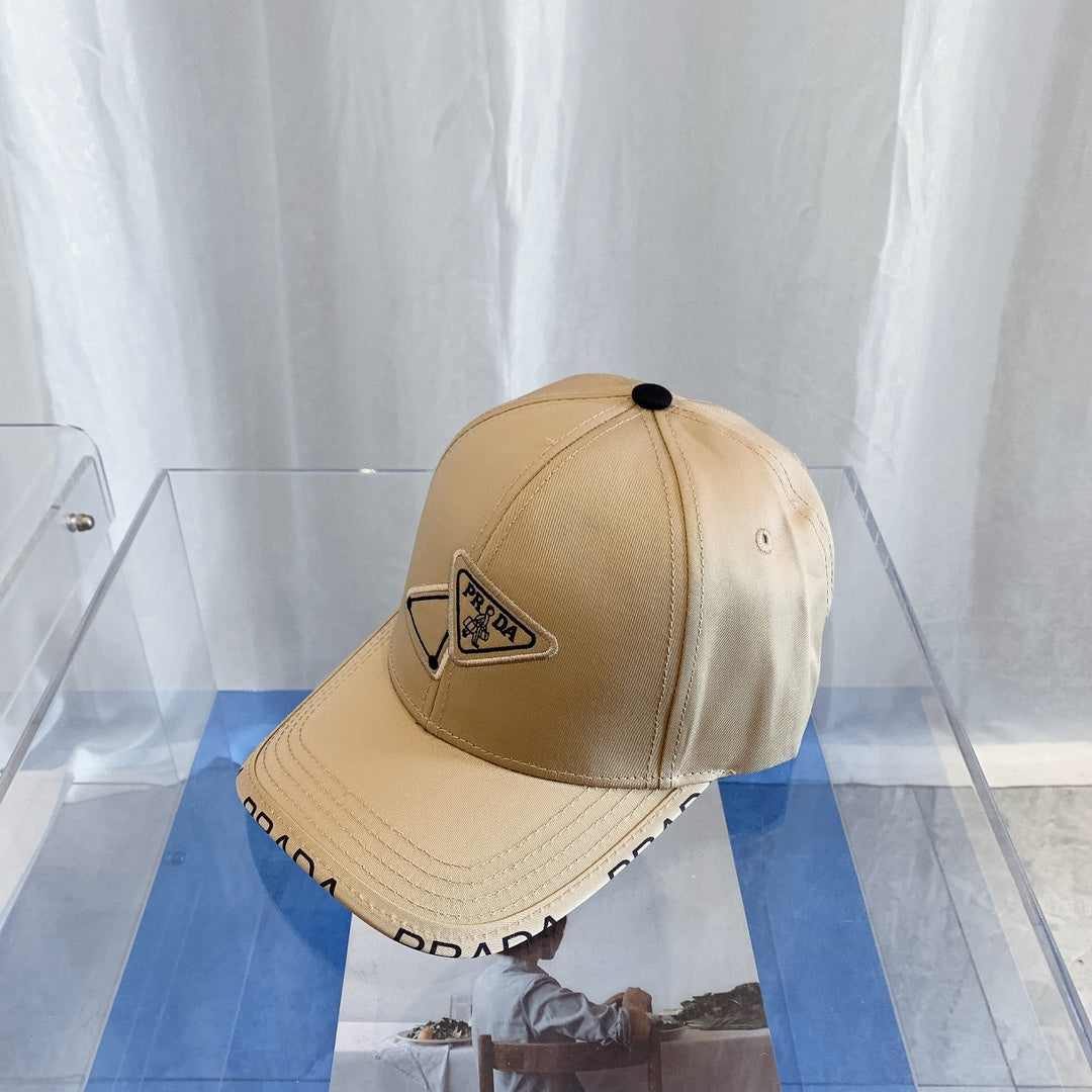 Prada embroidered baseball cap sand beige front view