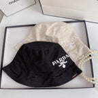 Prada embroidered drill bucket hat side view