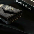 Prada iPhone 17 Pro Max wallet case detail shot