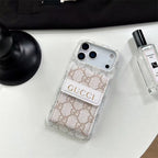 Gucci phone case on a white surface with a bottle of perfume.
