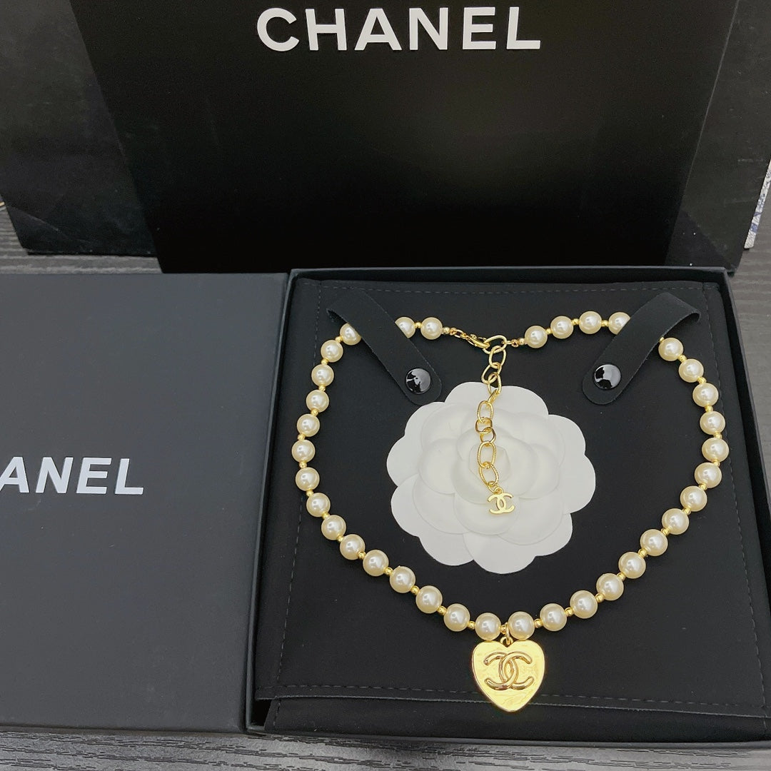 Chanel Heart Pendant Pearl Necklace – Luxury Designer Jewelry – product image 1
