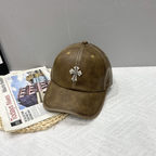 Brown leather cross emblem baseball cap detail