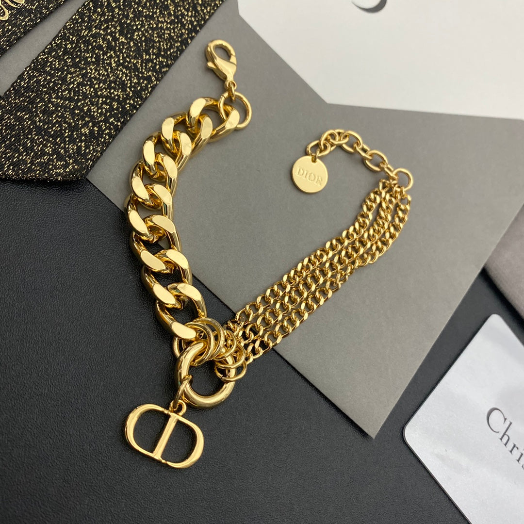 Dior Golden Thick Bracelet – Luxury Jewelry – product image 1