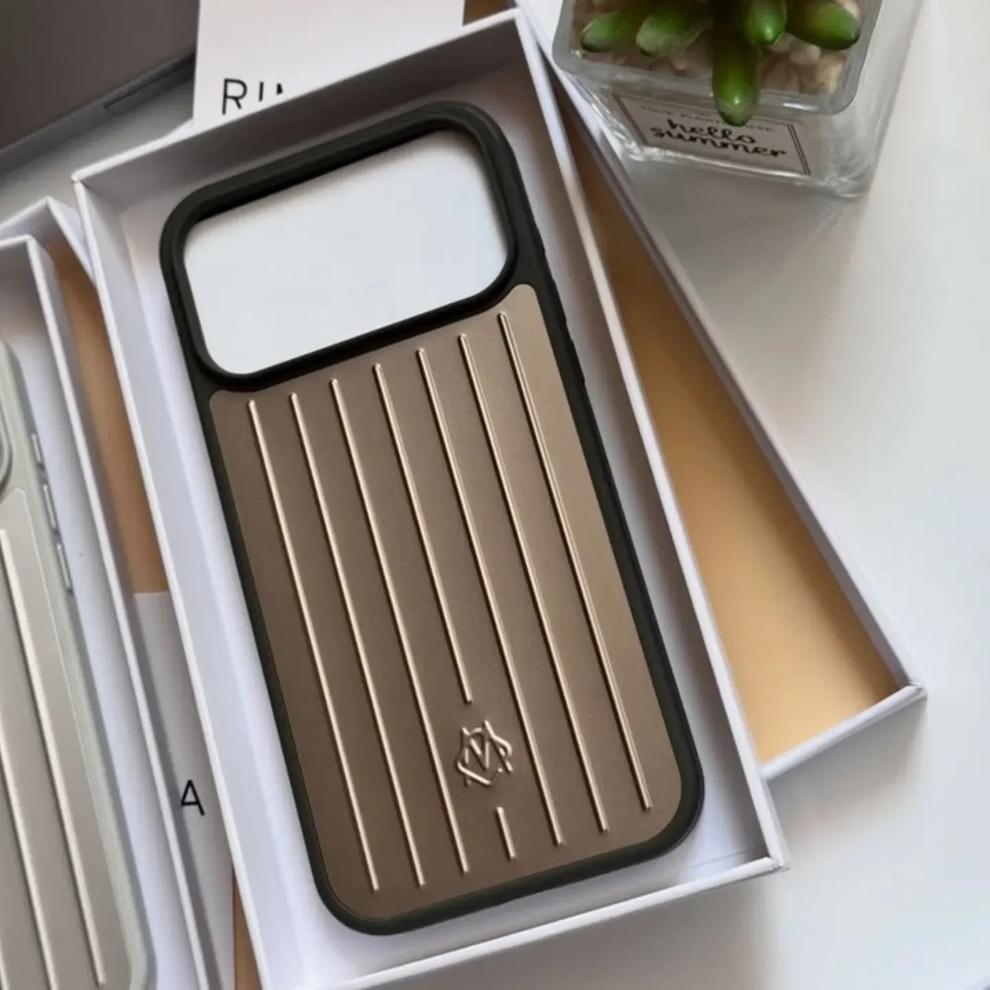 Gold Rimowa iPhone 17 Pro Max Case – Luxury Travel Design