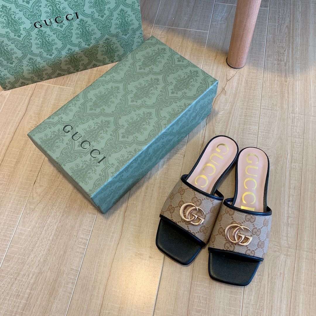 Gucci Brown Canvas Embossed Flat Slippers – slippers product image 1
