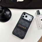 Gucci phone case on a white surface with a black background