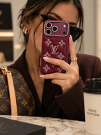 Burgundy Louis Vuitton case for iPhone 18 Pro – lifestyle view