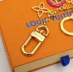 Louis Vuitton flower charm keychain with pastel enamel charms and gold-tone keyring
