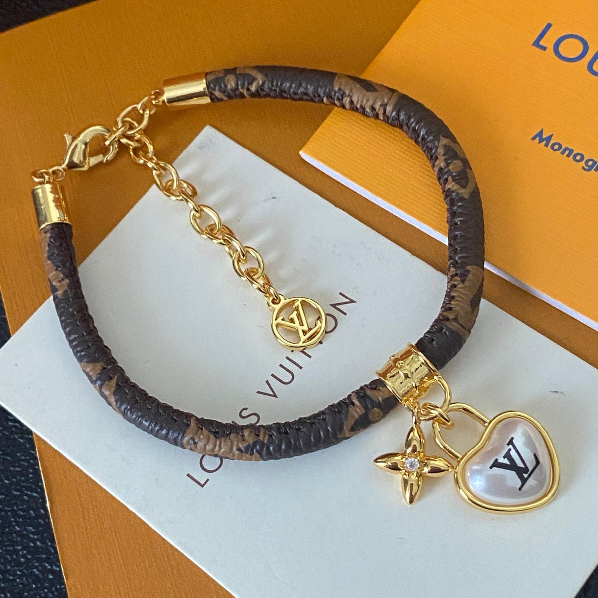 Louis Vuitton Love Pendant Leather Bracelet – Luxury Jewelry – product image 1