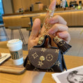 louis-vuitton-tassel-coin-purse-keychain-brown