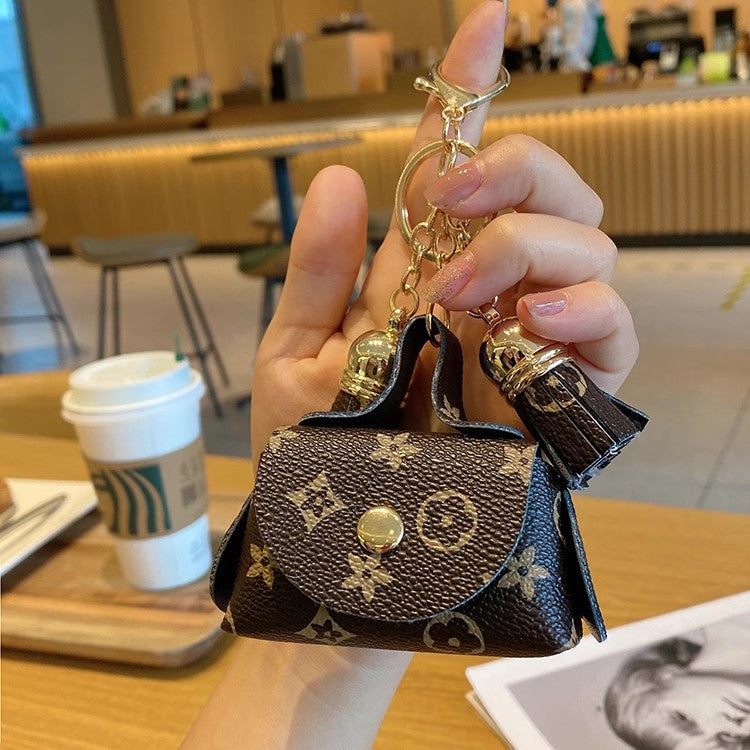louis-vuitton-tassel-coin-purse-keychain-brown