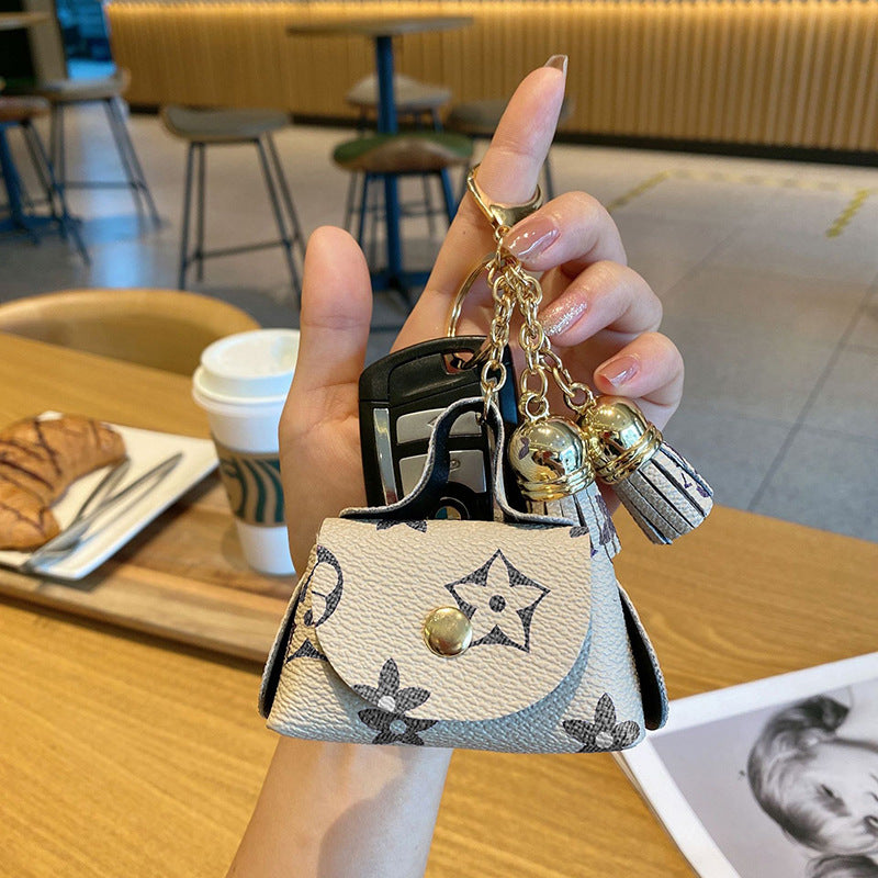 louis-vuitton-tassel-coin-purse-keychain-grey