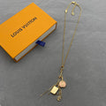Louis Vuitton Travel Bag Lock Pendant Necklace – Luxury Designer Jewelry – product image 1