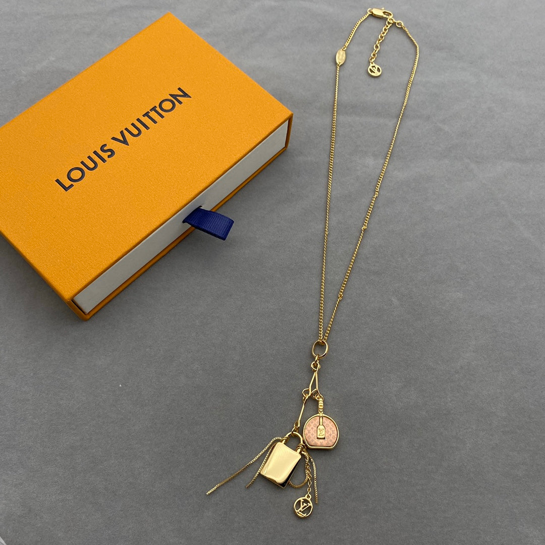 Louis Vuitton Travel Bag Lock Pendant Necklace – Luxury Designer Jewelry – product image 1