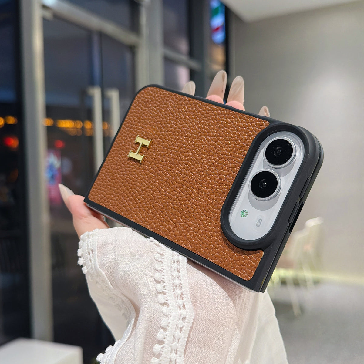 Black frame and camera surround on textured iPhone Duo case