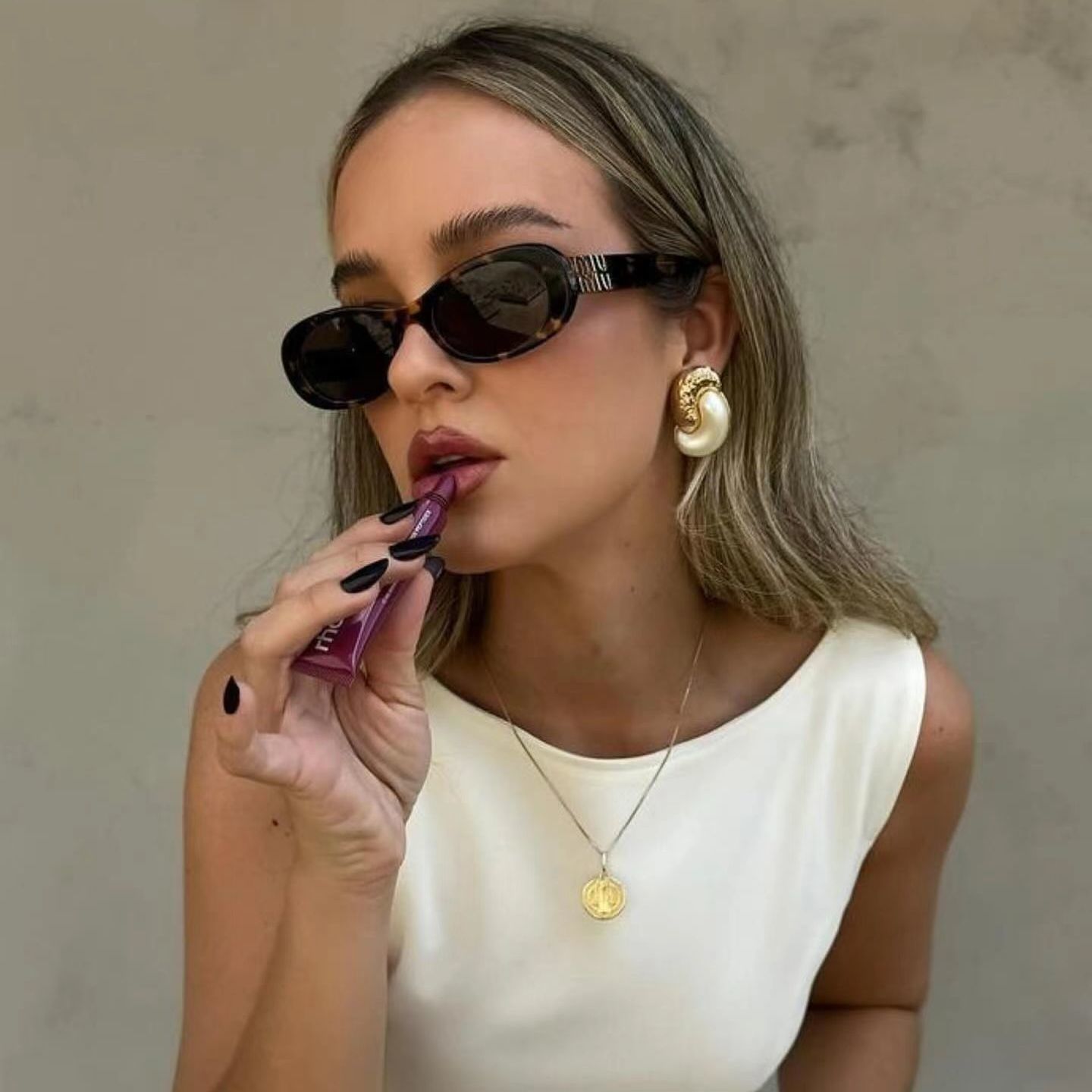 Miu Miu Retro Oval Polarized Sunglasses for Unisex – product image 6