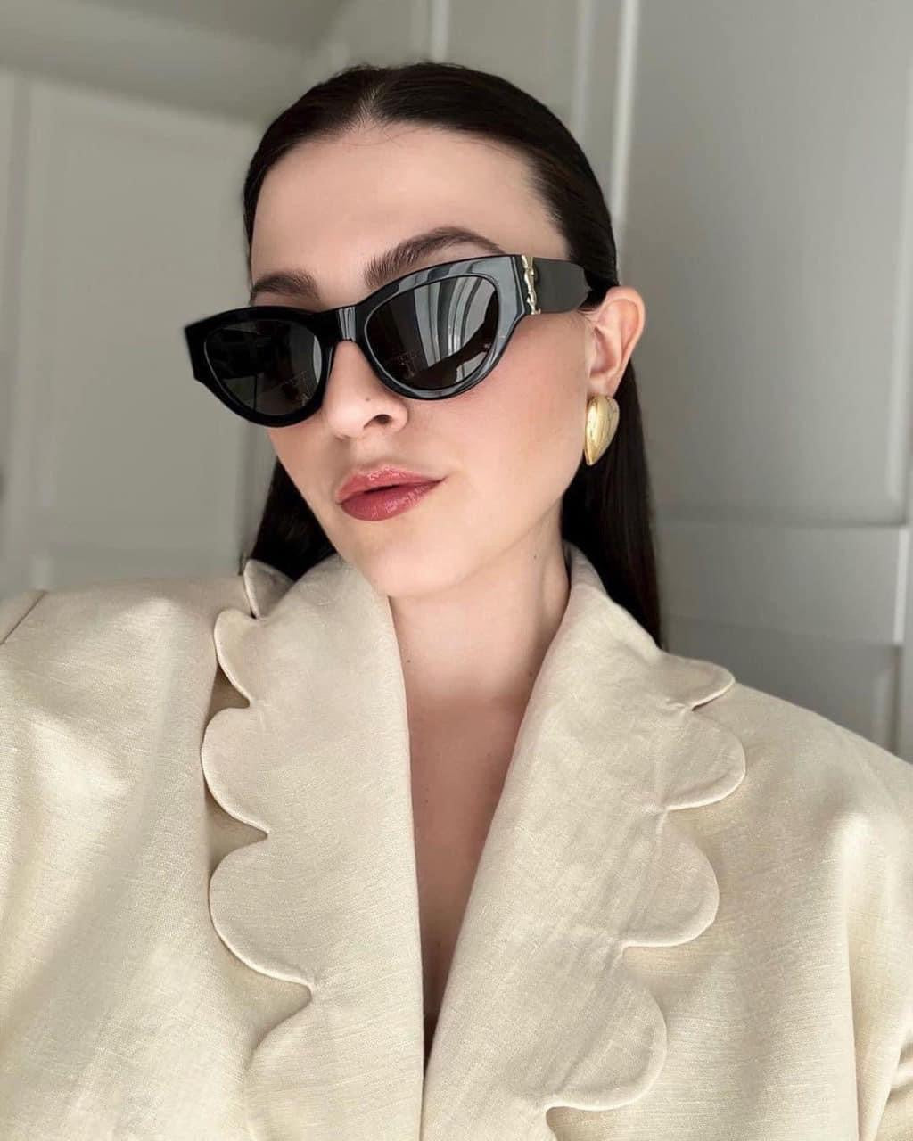 Miu Miu Sculpted Cat-Eye Polarized Sunglasses for Unisex – product image 1