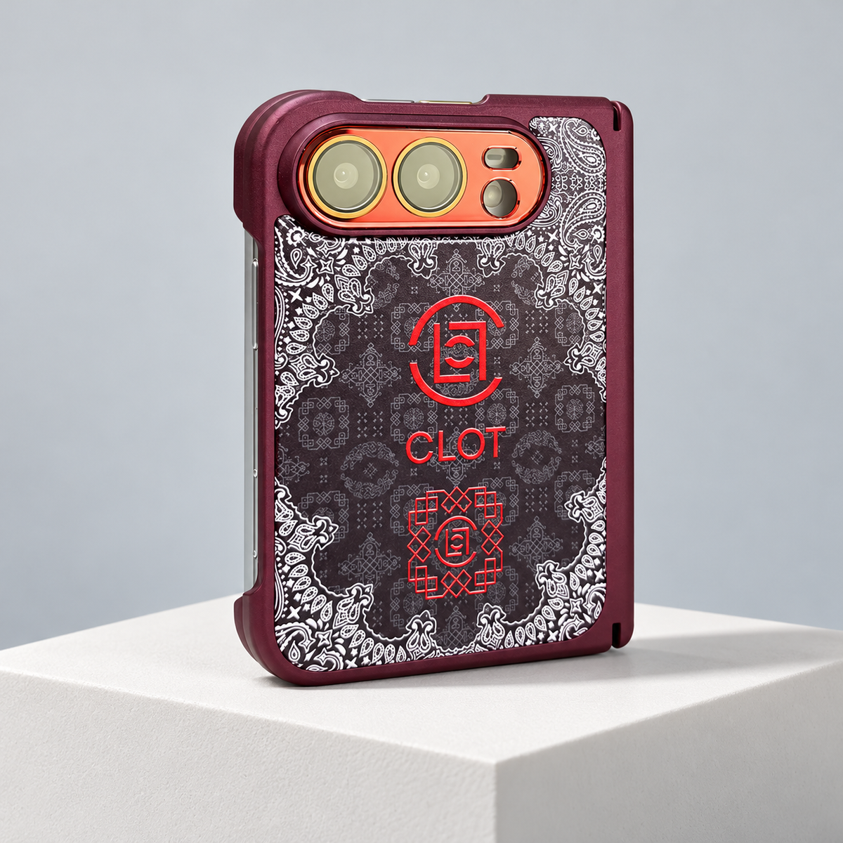 CLOT Paisley Border iPhone Duo Case in Burgundy — studio view