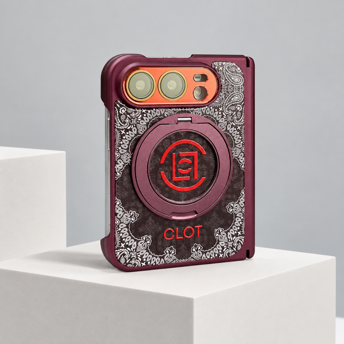CLOT Paisley Ring-Stand iPhone Duo Case in Burgundy — studio view