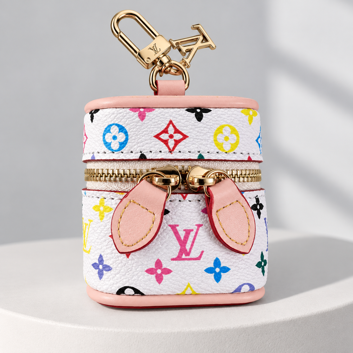 Louis Vuitton Color-Pop Monogram Earbud Pouch in White Small Multicolor — front view on a neutral studio display
