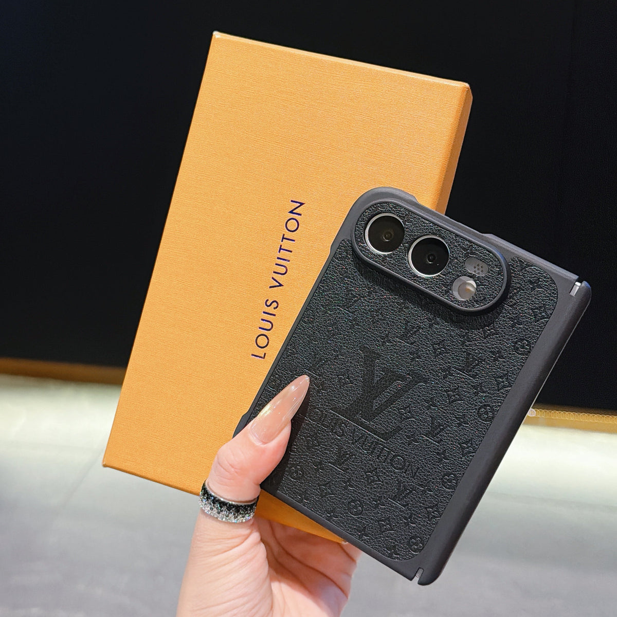 Louis Vuitton Embossed Monogram iPhone Duo Case in gallery detail