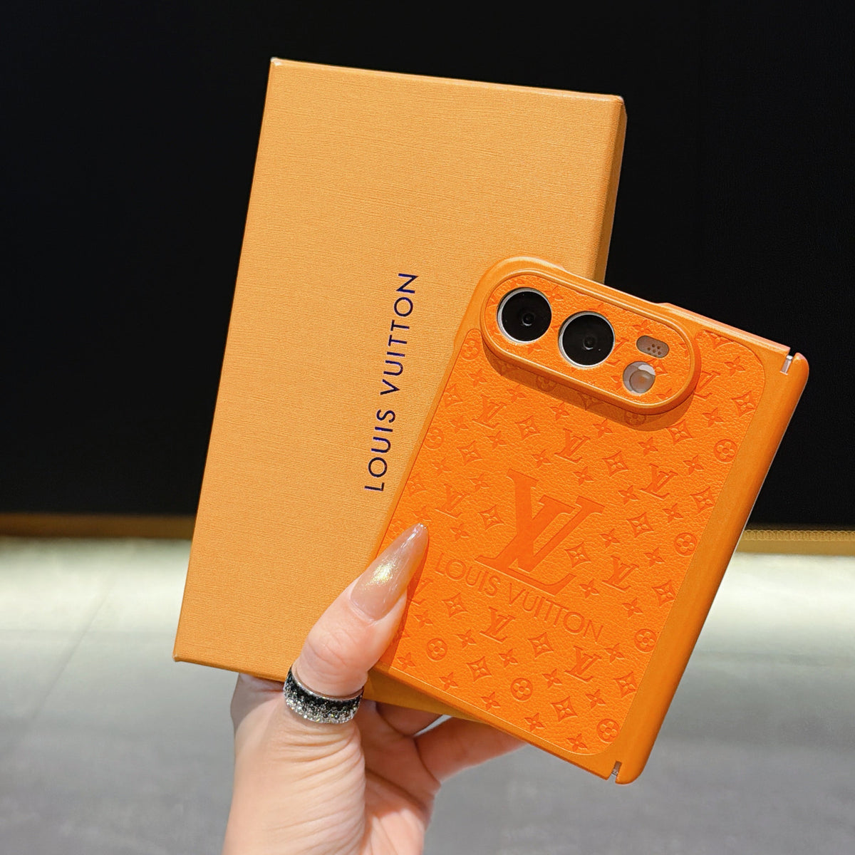 Louis Vuitton Embossed Monogram iPhone Duo Case in gallery detail
