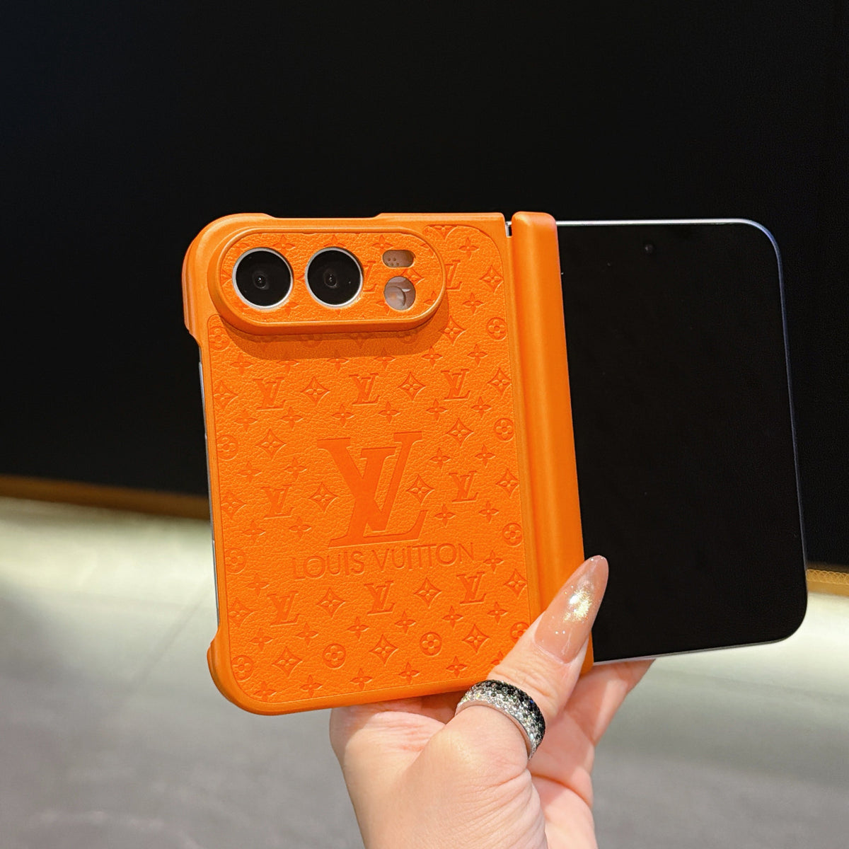 Louis Vuitton Embossed Monogram iPhone Duo Case in Orange finish