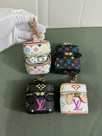 Louis Vuitton Multicolor Monogram Zip Earbud Pouch in pattern and finish overview